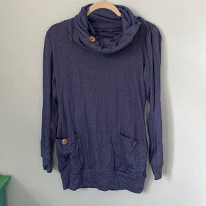 Small blue long sleeve shirt